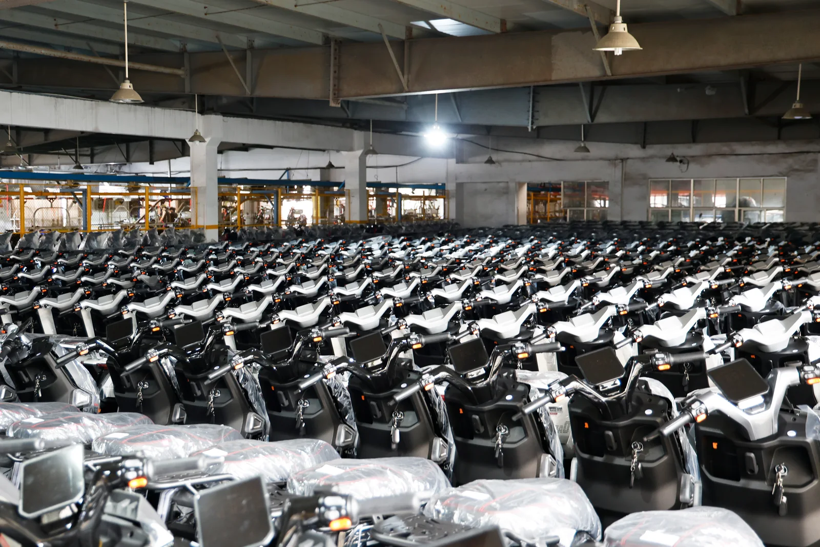 Rows of electric vehicles in the warehouse